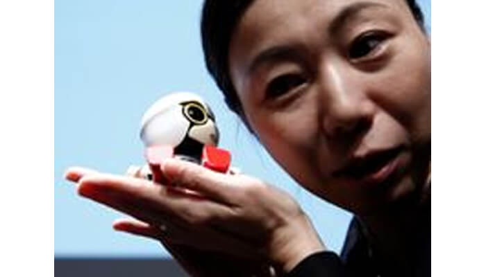 The four-inch tall robot speaks with a high-pitched baby voice