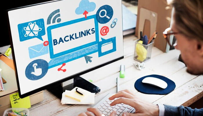 Man working on system to build high-quality backlinks for niche market seo