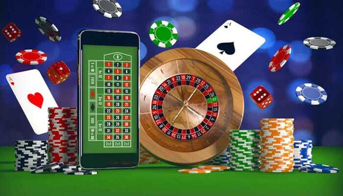 Digital roulette wheel, poker chips, playing cards, and a mobile screen, symbolizing the role of random number generators (rng) in powering online casino games