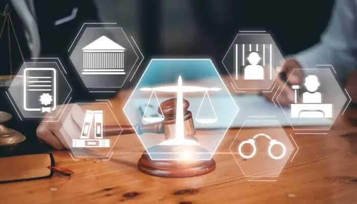 Modern legal practice concept with digital icons overlaying a gavel, scales of justice, courthouse, handcuffs, and legal books.