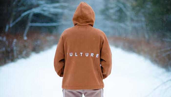 Wintet hoodie designs: a person wearing brown winter hoodie design with'Culture' printed on the back.