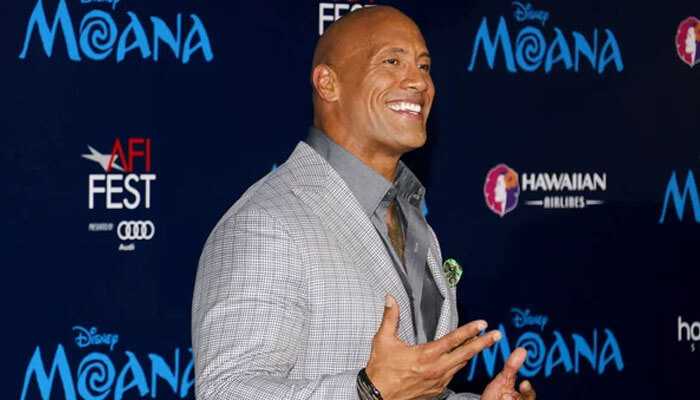 Dwayne johnson, also known as the rock, at the disney moana premiere, highlighting discussions around the rock net worth.