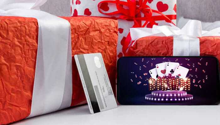 Gift boxes with a credit card and a smartphone showing an interface of a casino game, depicting online gaming gift cards.