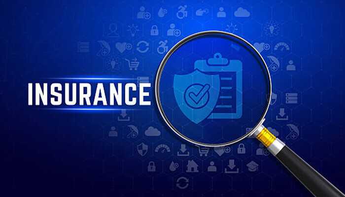 Magnifying glass highlighting digital insurance icons, symbolizing the role of insurance verification software in accurate healthcare coverage checks.