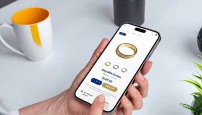 Person browsing to buy diamonds and engagement rings online using a mobile app, showcasing a smart and convenient shopping experience.