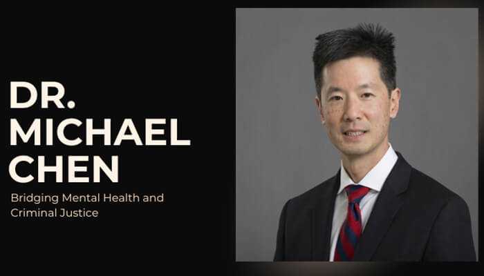 Dr. Michael chen, expert bridging mental health and criminal justice, in a formal suit portrait.
