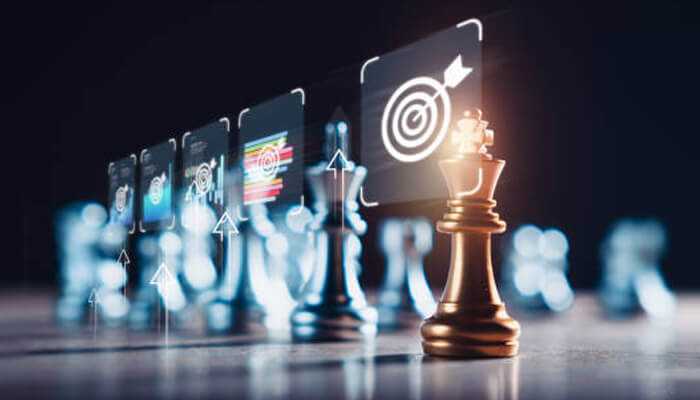 Strategic planning concept with chess pieces and digital targets, symbolizing goal tracking in product management software.